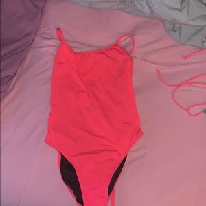 Neon pink jolyn tie back one piece
